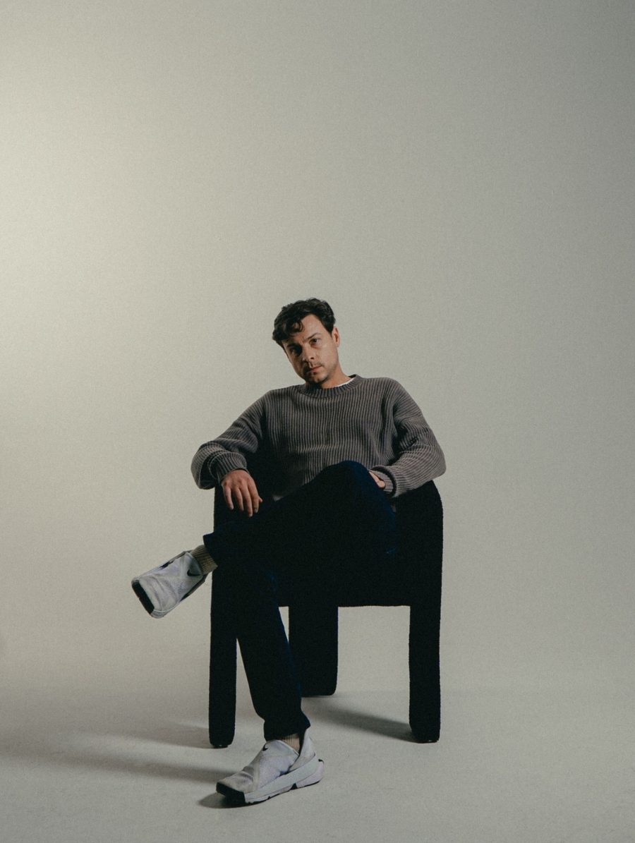 David seated in chair, studio portrait